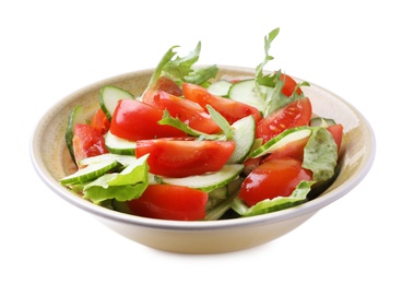 Delicious fresh cucumber tomato salad in bowl on white background