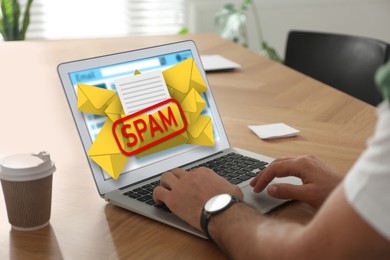 Image of Spam warning message, envelope illustrations popping out of device display. Man using email software on laptop at table, closeup