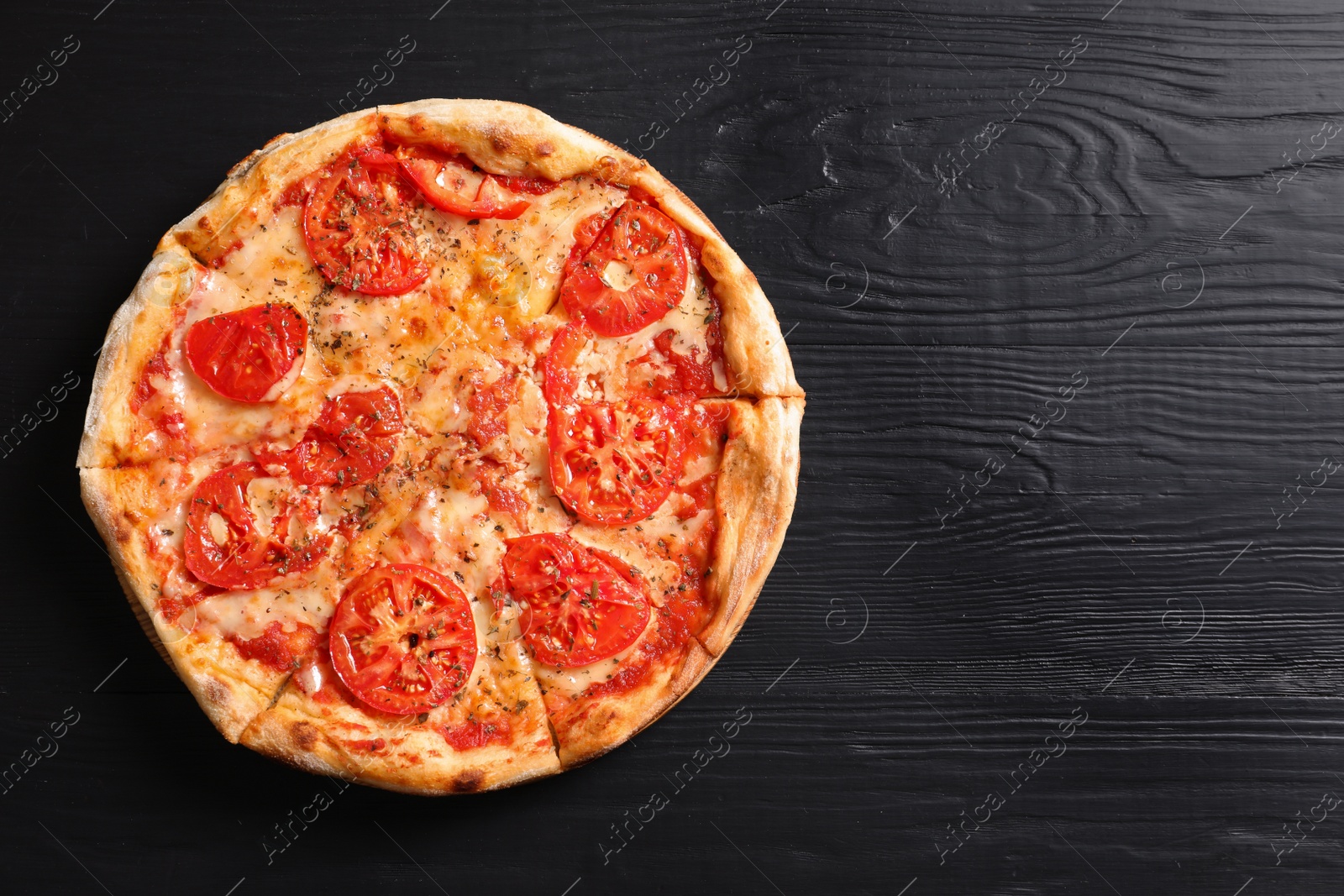 Photo of Hot cheese pizza Margherita on wooden table, top view. Space for text