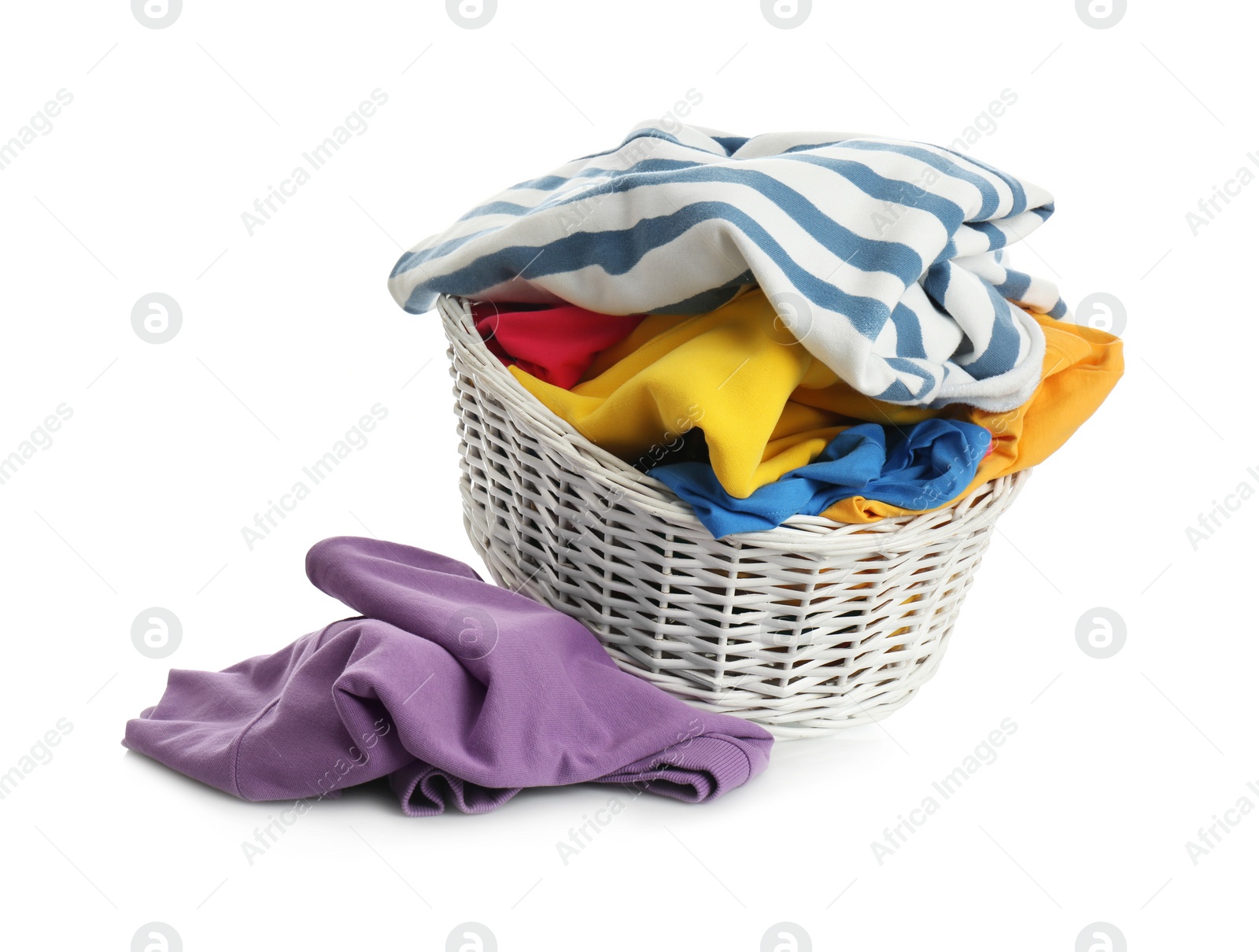 Photo of Wicker laundry basket with different clothes isolated on white