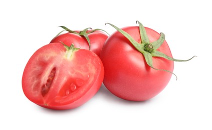 Photo of Whole and cut red tomatoes on white background