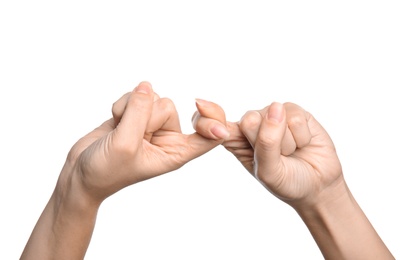 Woman showing word friend on white background, closeup. Sign language