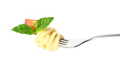 Fork with tasty pasta, piece of tomato and basil isolated on white