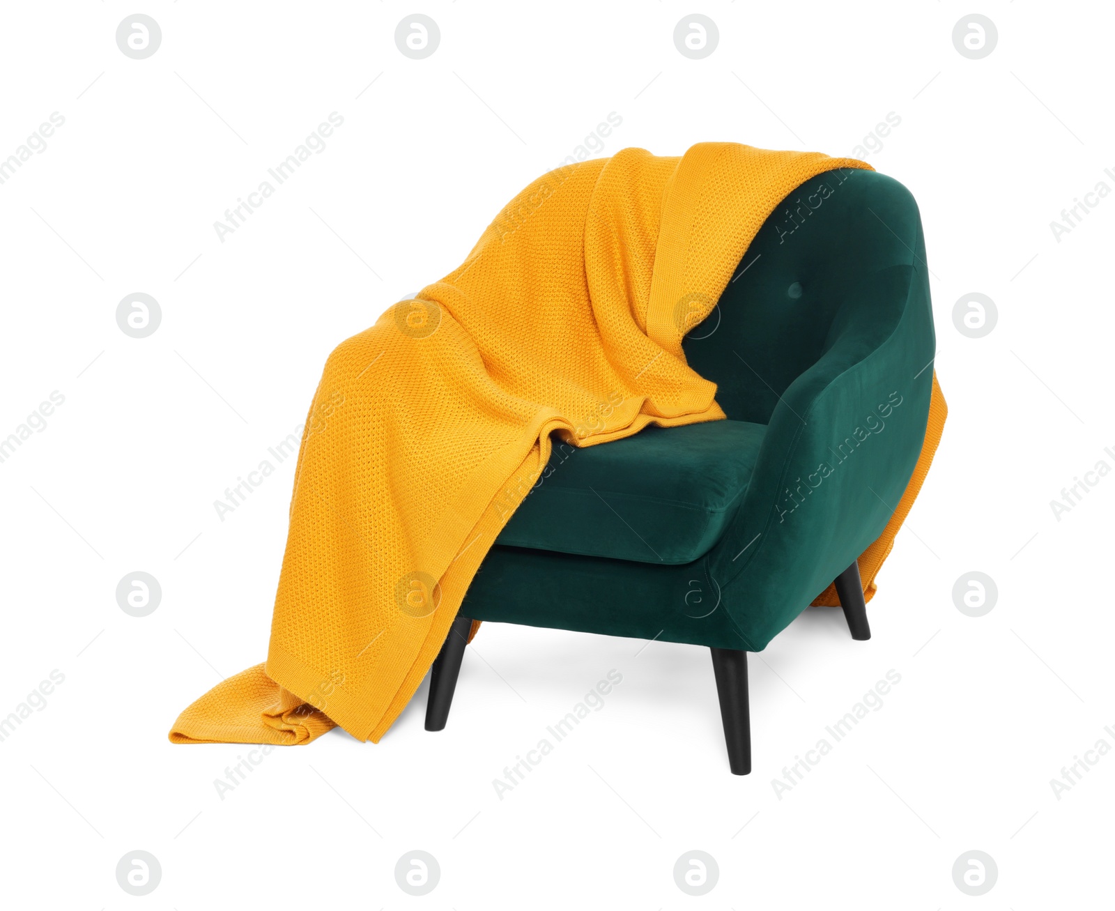 Photo of One stylish comfortable armchair with blanket isolated on white