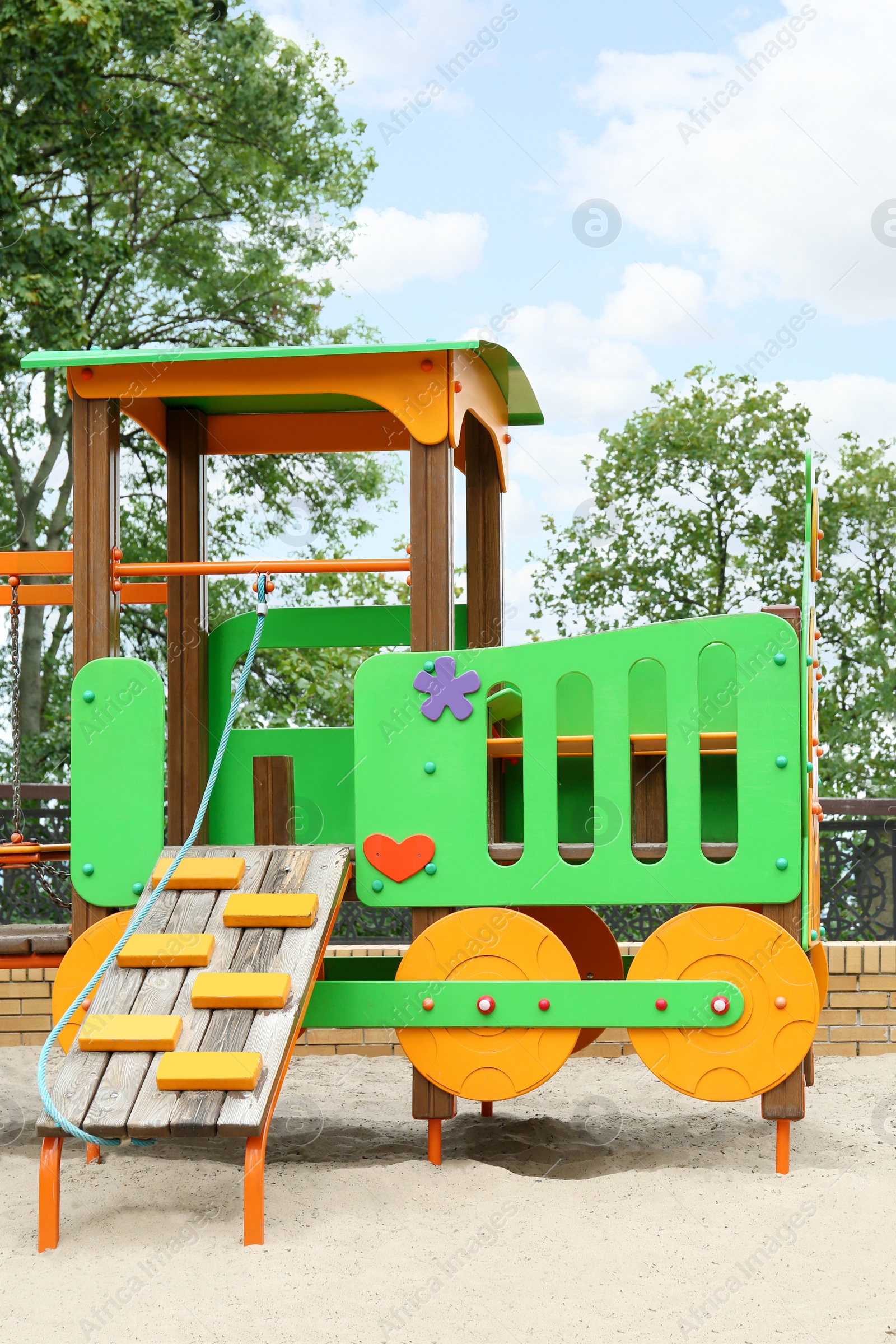 Photo of Children's playground with new colorful train playset