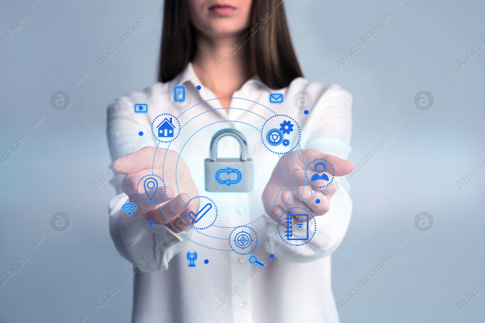 Image of Home security concept. Woman demonstrating lock on grey background, closeup