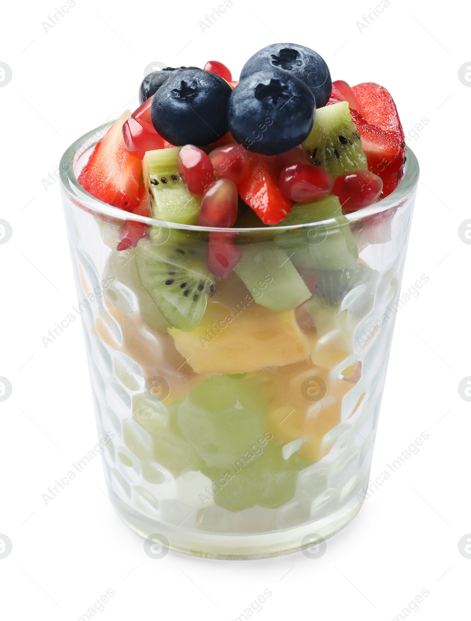 Photo of Healthy breakfast. Delicious fruit salad in glass isolated on white