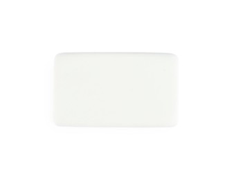 Photo of New eraser isolated on white, top view. School stationery