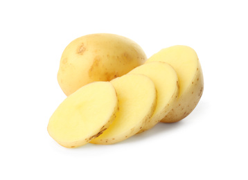 Photo of Whole and cut fresh raw organic potatoes on white background