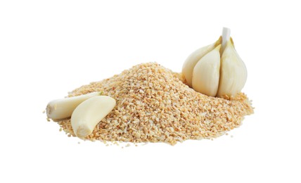 Photo of Heap of dehydrated garlic granules and peeled cloves isolated on white