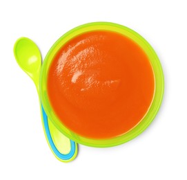 Photo of Delicious baby food in bowl and spoon isolated on white, top view