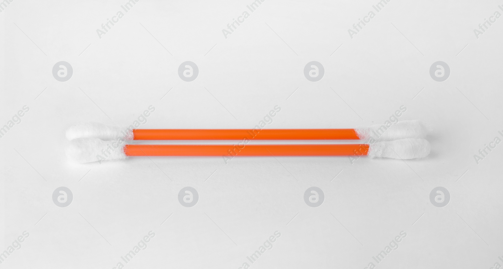 Photo of Clean cotton buds on white background. Hygienic accessory