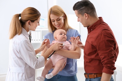 Photo of Parents with their baby visiting children's doctor in hospital