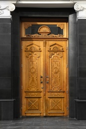 Closed vintage wooden door in old building