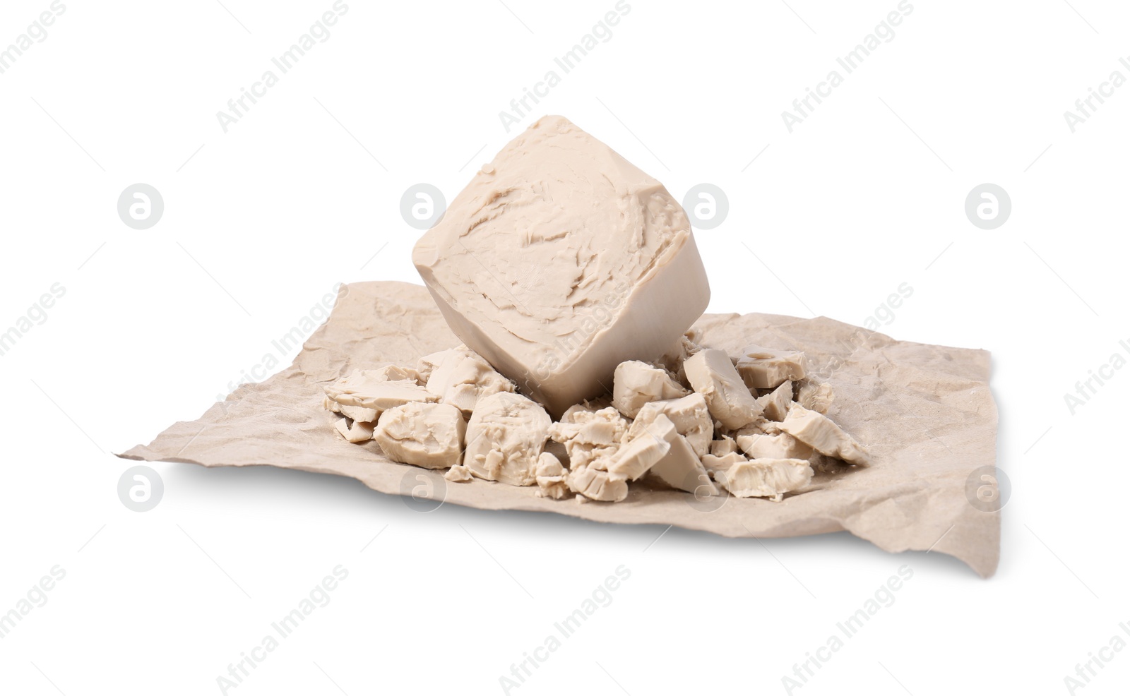 Photo of Pieces of compressed yeast isolated on white