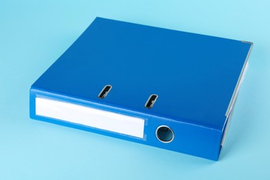 Photo of Hardcover office folder on light blue background