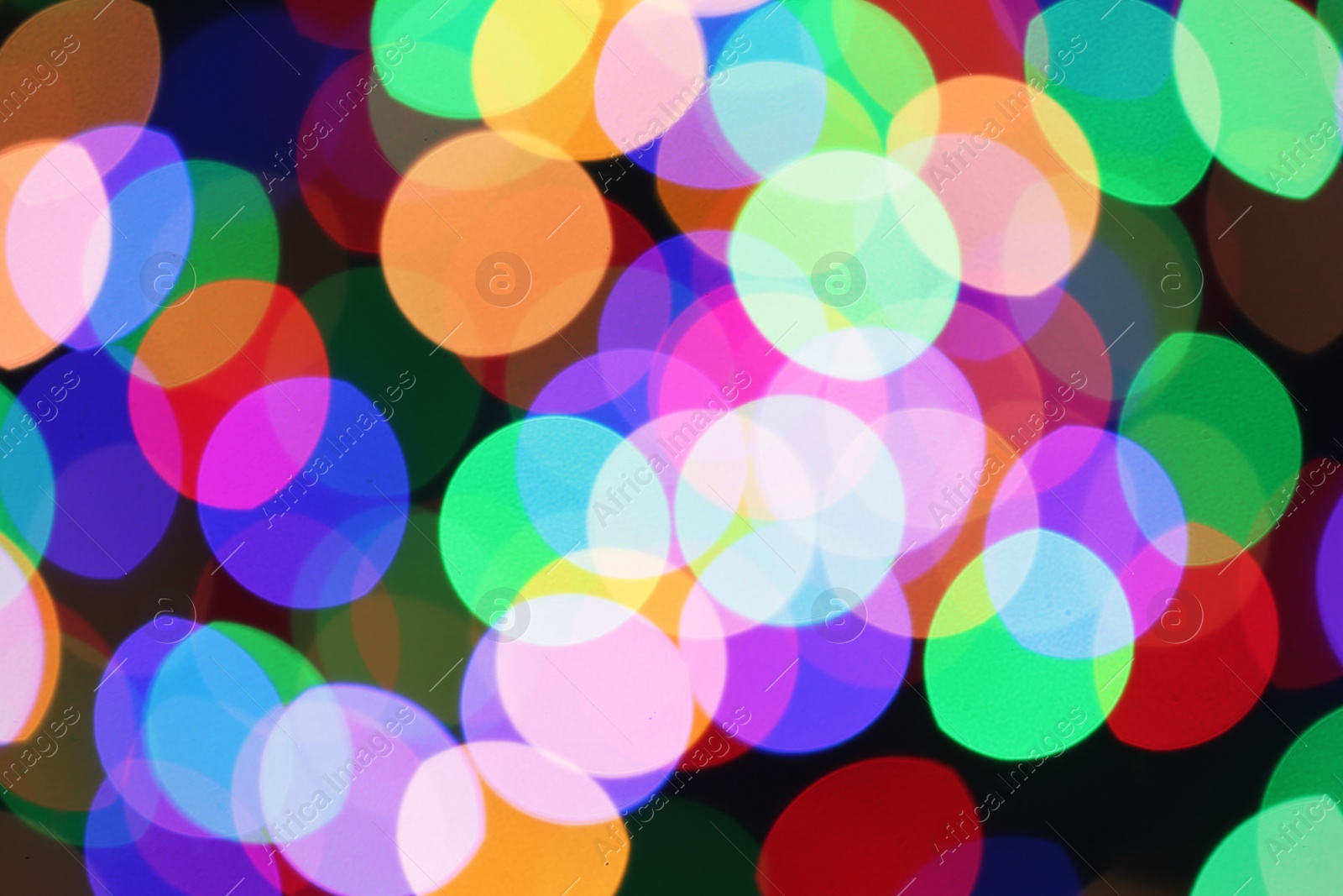 Photo of Beautiful colorful lights as background. Bokeh effect