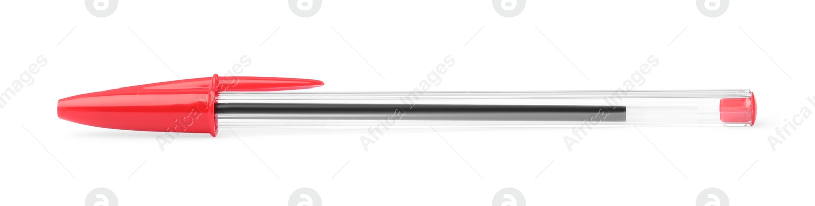 Photo of New red plastic pen isolated on white