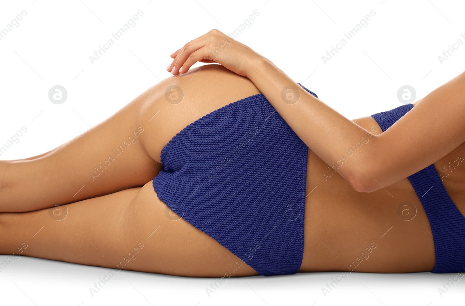 Photo of Sexy young woman in stylish swimsuit isolated on white, closeup. Beach body goal