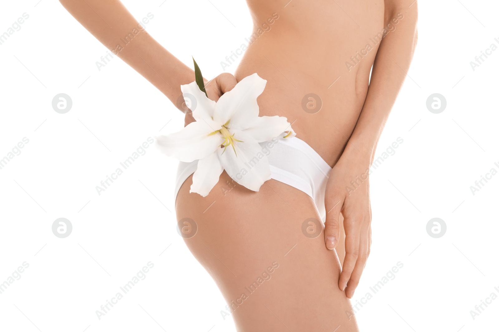 Photo of Young woman with flower showing smooth silky skin after epilation on white background