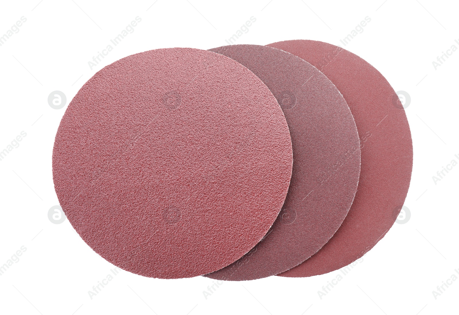 Photo of Many coarse sandpaper disks isolated on white, top view