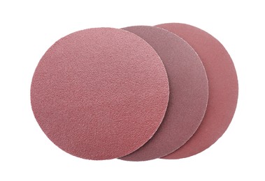 Photo of Many coarse sandpaper disks isolated on white, top view