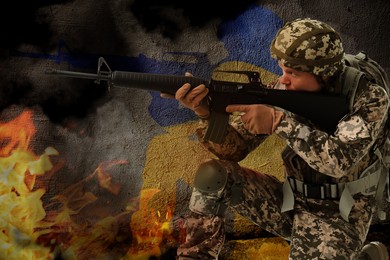 Military, shadow of soldier in colors Ukrainian flag and flame