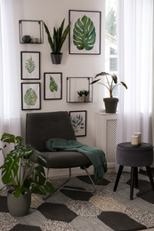 Photo of Living room interior with beautiful artworks on wall