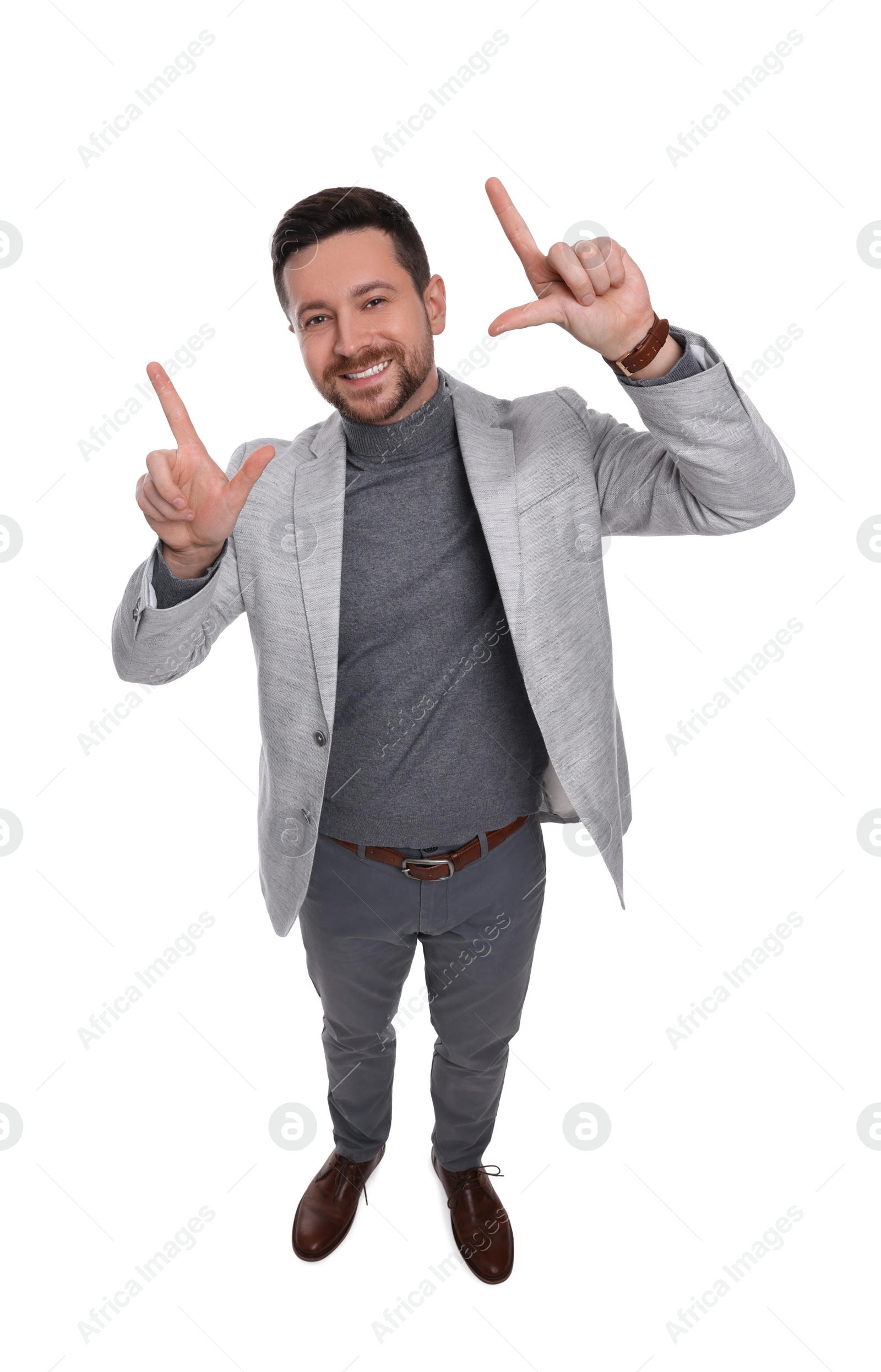 Photo of Handsome bearded businessman in suit on white background, above view