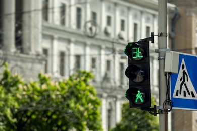 Photo of View of traffic light in city on sunny day. Space for text