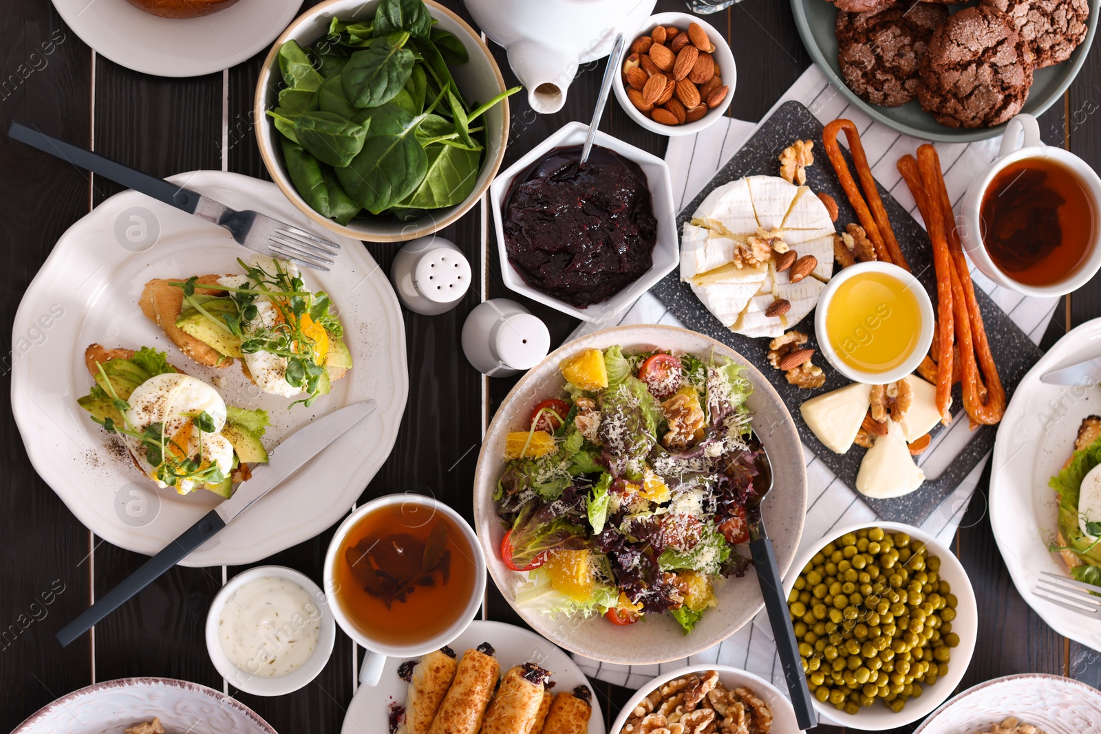 Photo of Many different dishes served on buffet table for brunch, flat lay