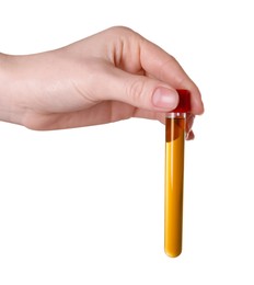 Woman holding test tube with brown liquid on white background, closeup