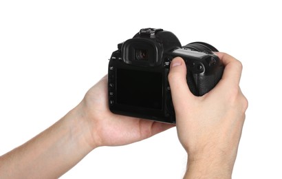 Photographer holding modern camera on white background, closeup