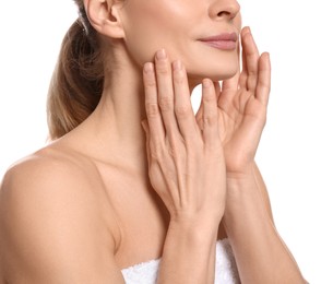 Photo of Woman massaging her face on white background, closeup