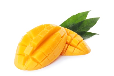 Photo of Fresh juicy mango halves and leaves on white background