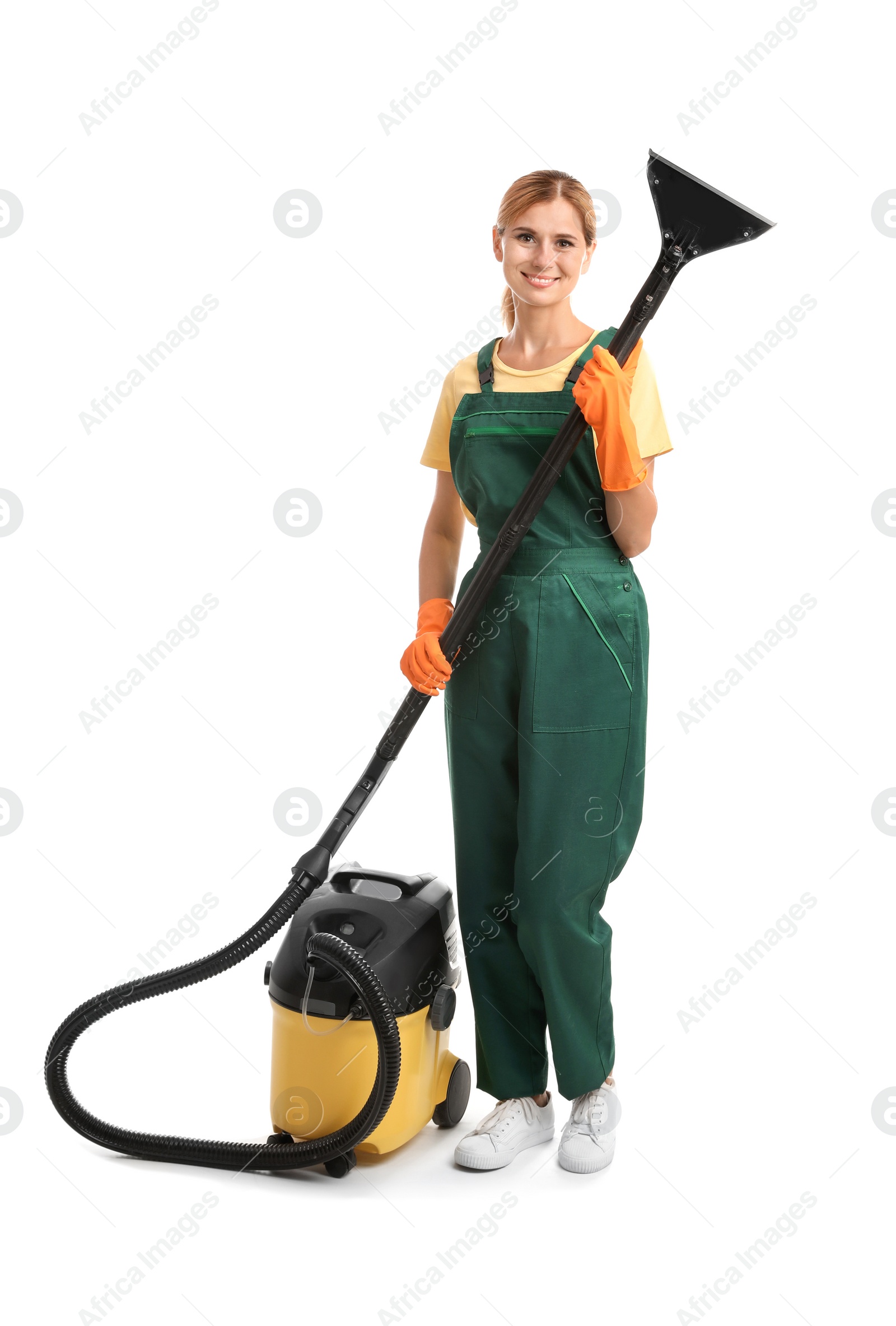 Photo of Female janitor with carpet cleaner on white background