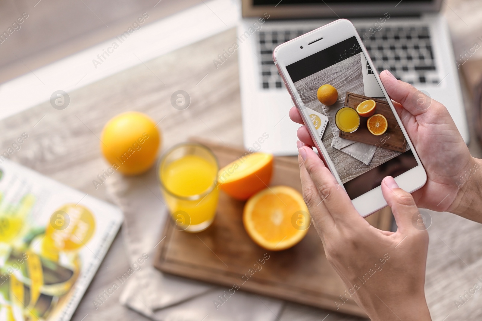 Photo of Blogger taking photo of food with mobile phone, closeup. Space for text