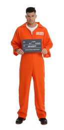 Photo of Prisoner in orange jumpsuit with mugshot letter board on white background