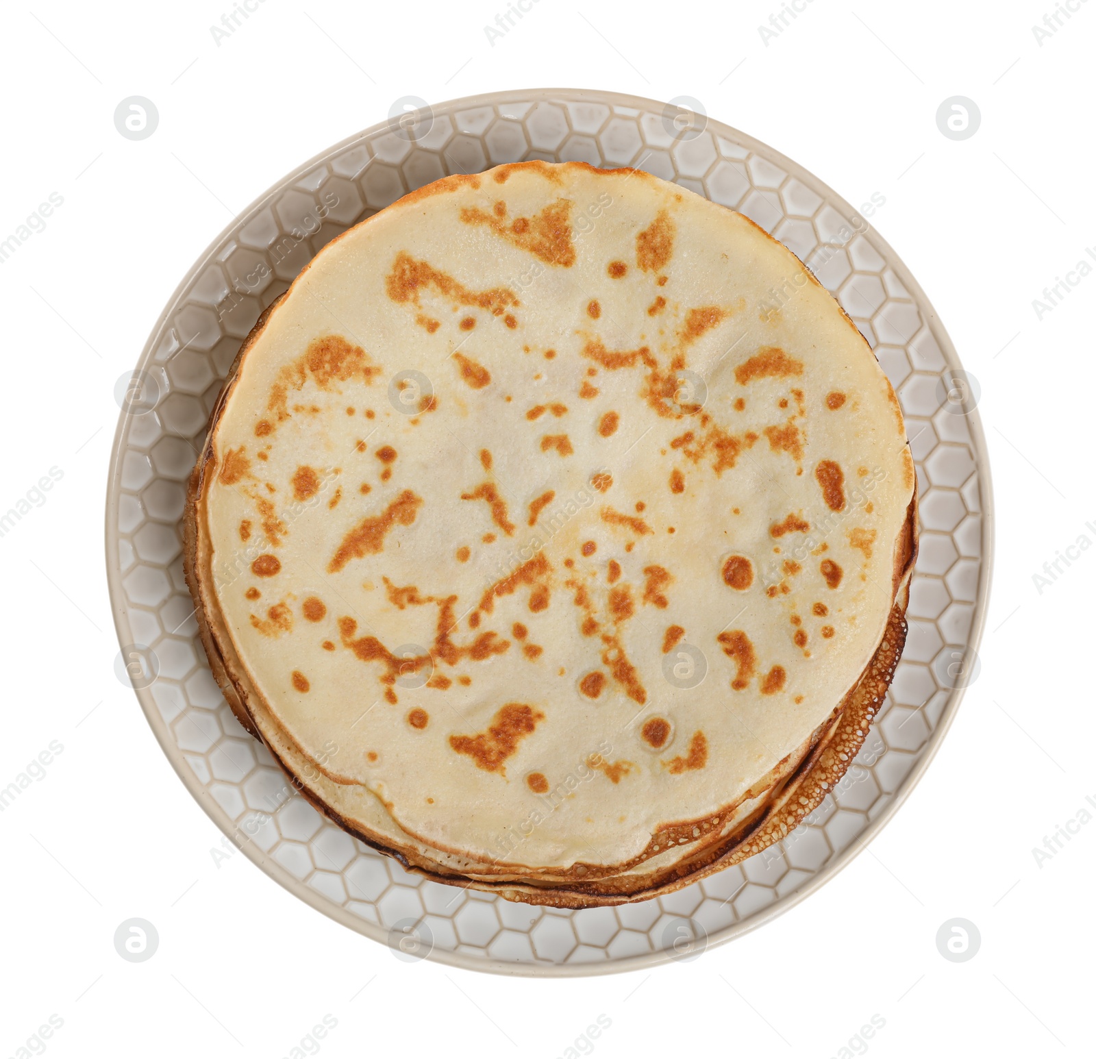 Photo of Stack of delicious crepes on plate against white background, top view