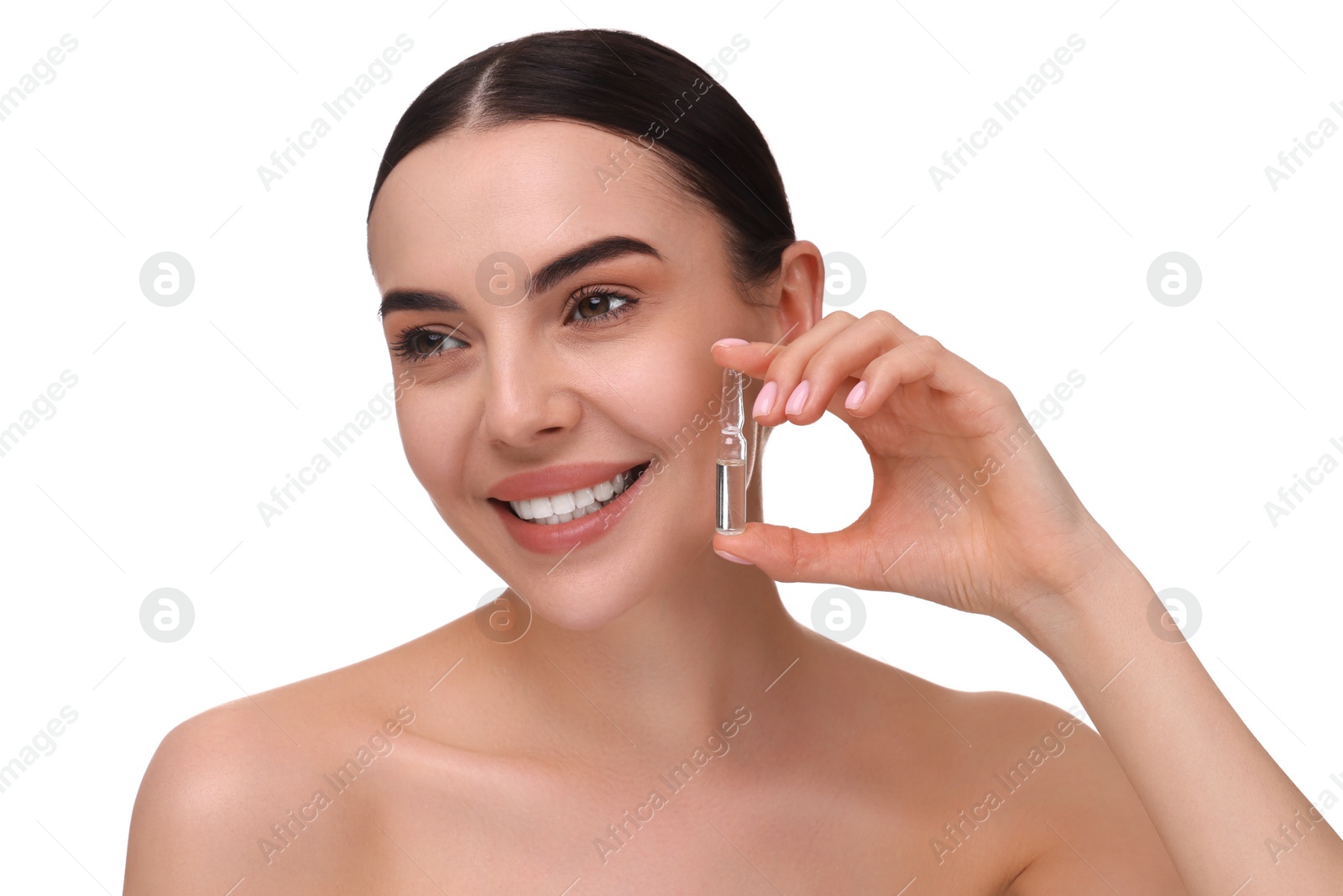 Photo of Beautiful young woman holding skincare ampoule on white background