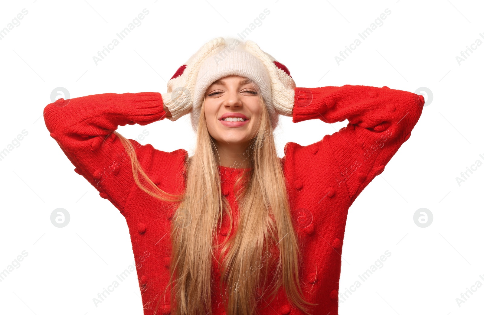 Photo of Portrait of emotional young woman in stylish clothes on white background. Winter atmosphere