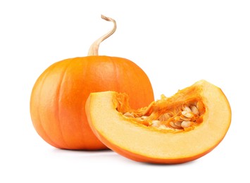 Photo of Whole and cut fresh ripe pumpkins isolated on white