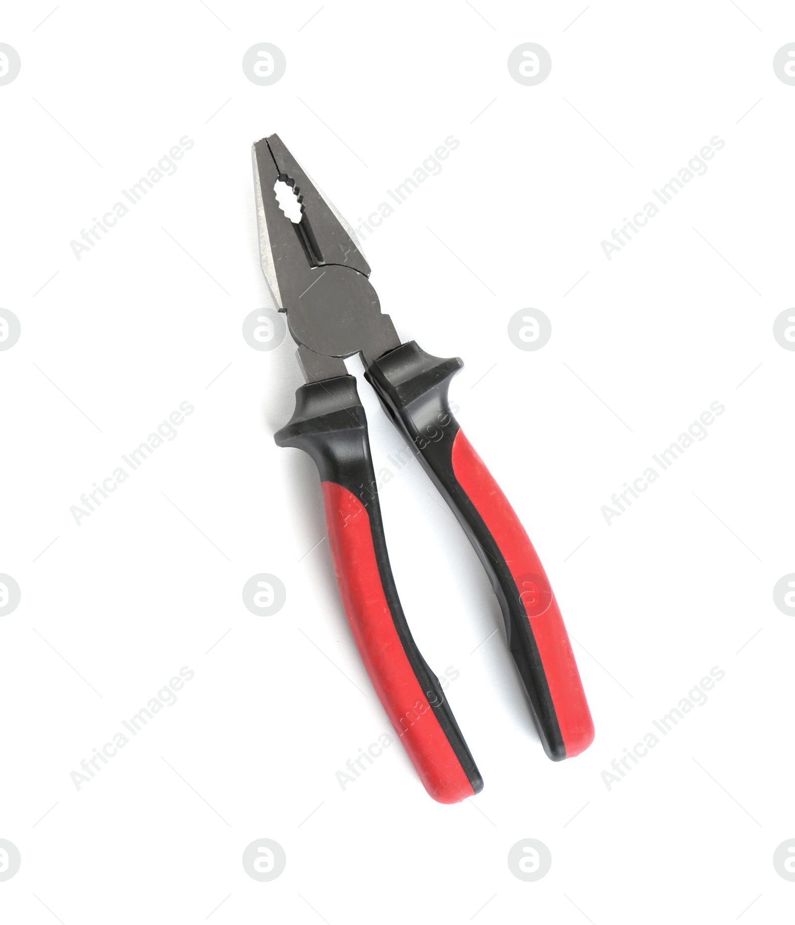 Photo of New pliers on white background, top view. Construction tools