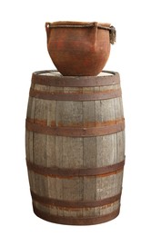 Image of One wooden barrel with clay pot isolated on white