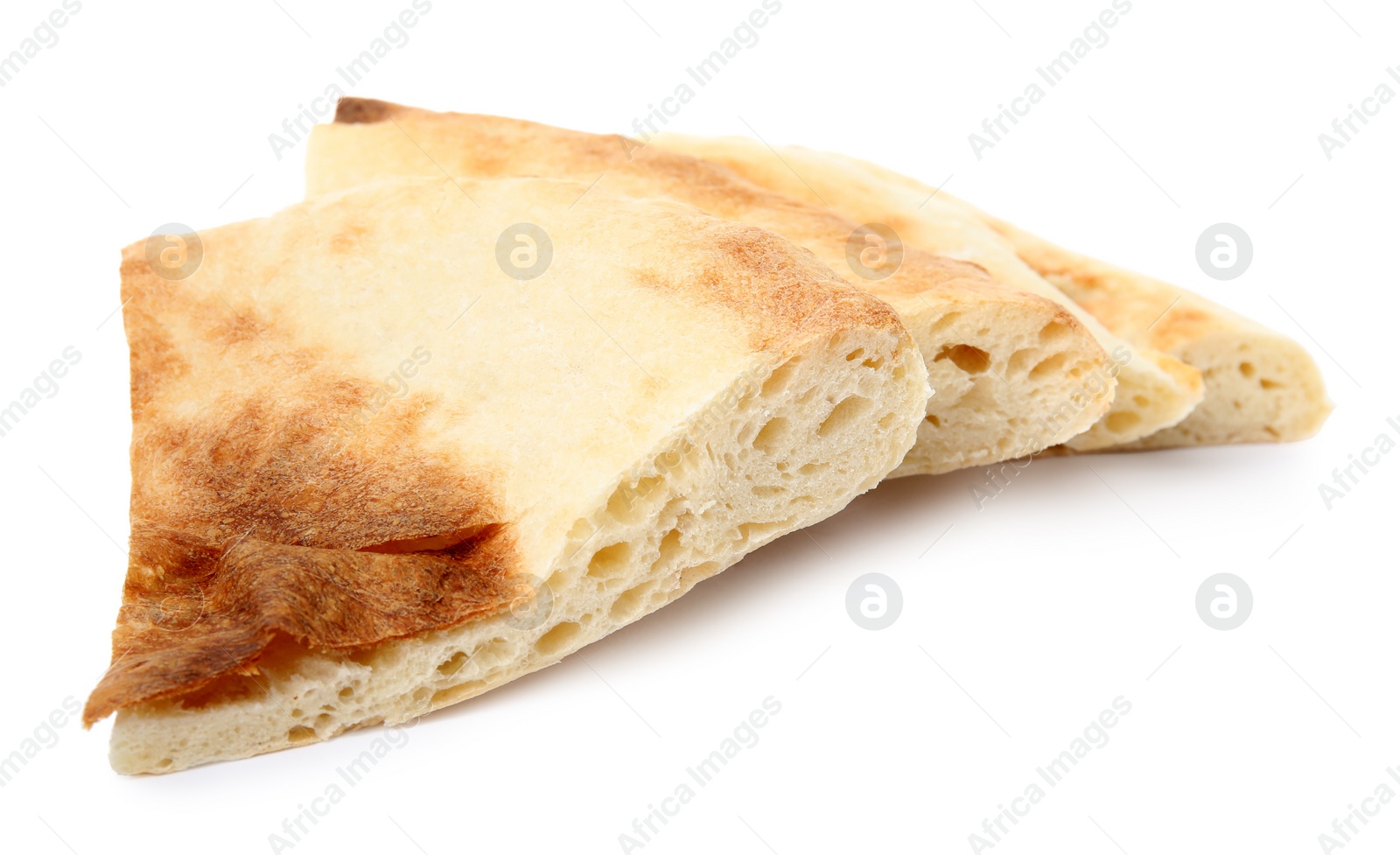 Photo of Cut fresh pita bread on white background