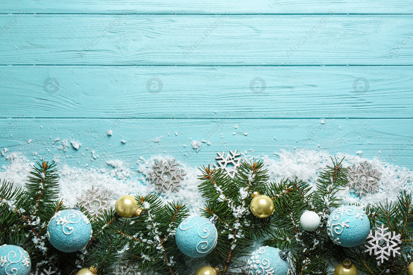 Photo of Flat lay composition with Christmas decorations on blue wooden background, space for text. Winter season