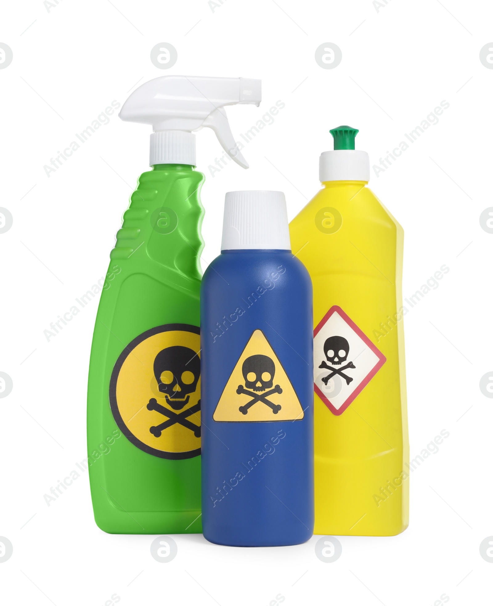 Photo of Bottles of toxic household chemicals with warning signs on white background