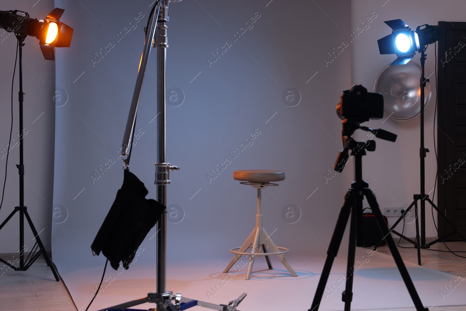 Photo of Casting call. Chair and different equipment in modern studio