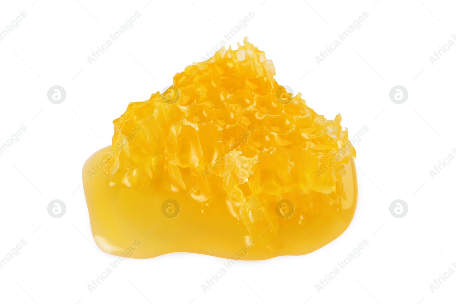 Photo of Piece of natural honeycomb with tasty honey isolated on white