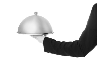 Waiter holding metal tray with lid on white background, closeup